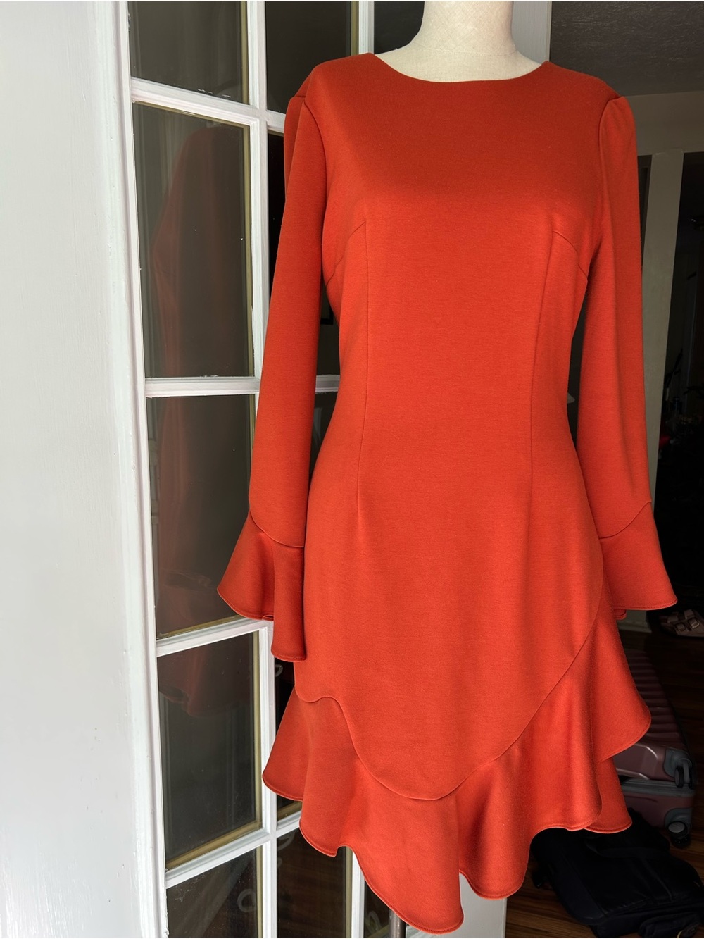 Gianni Bini orange spice Ruffle-Hem Long Sleeve Dress.